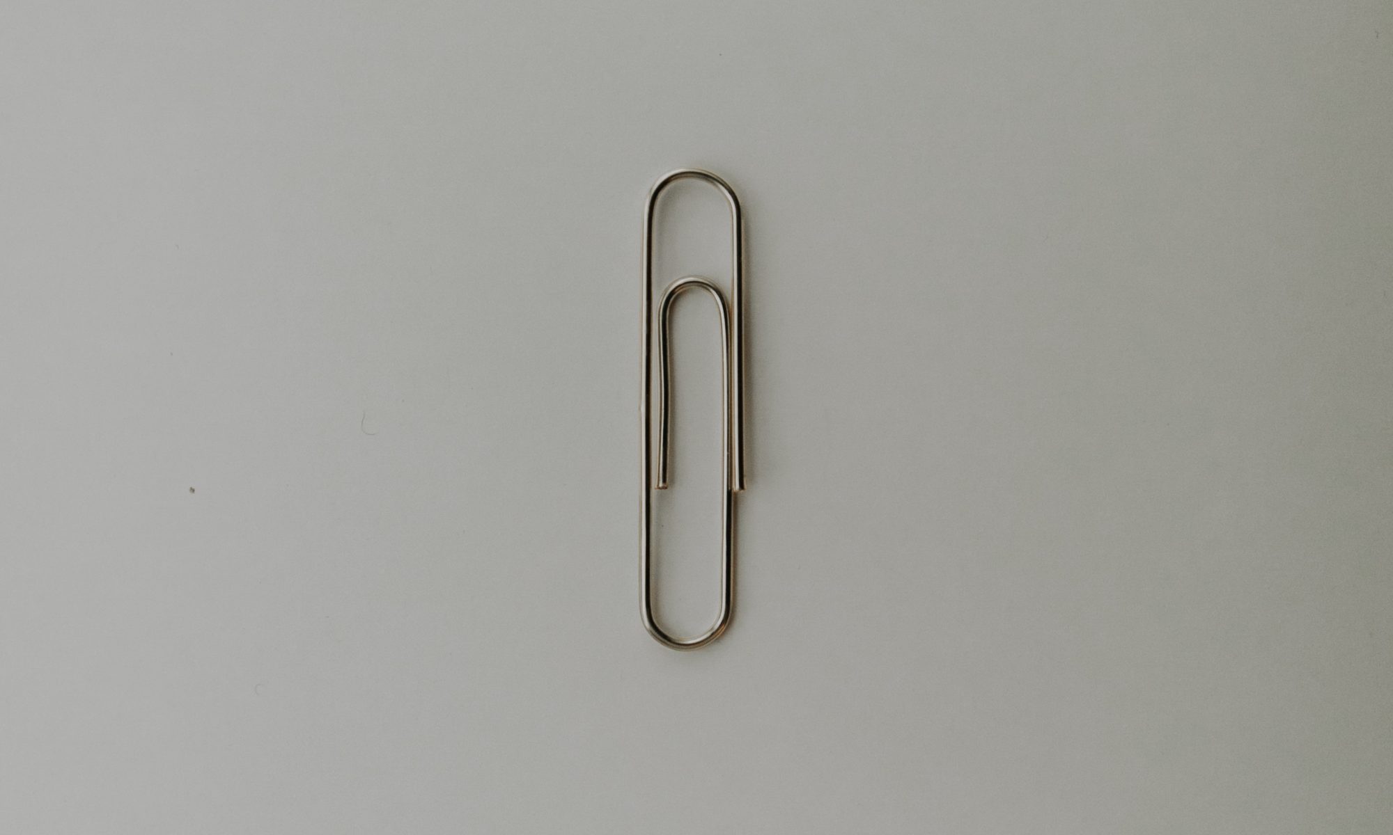 Photo of a paper clip; indicates simplicity